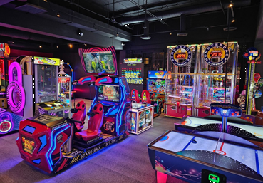 How do coin-operated arcade machines work?