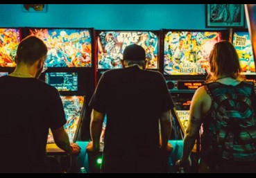 How were arcade games programmed?