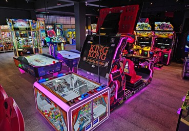 Why do arcades use tickets?